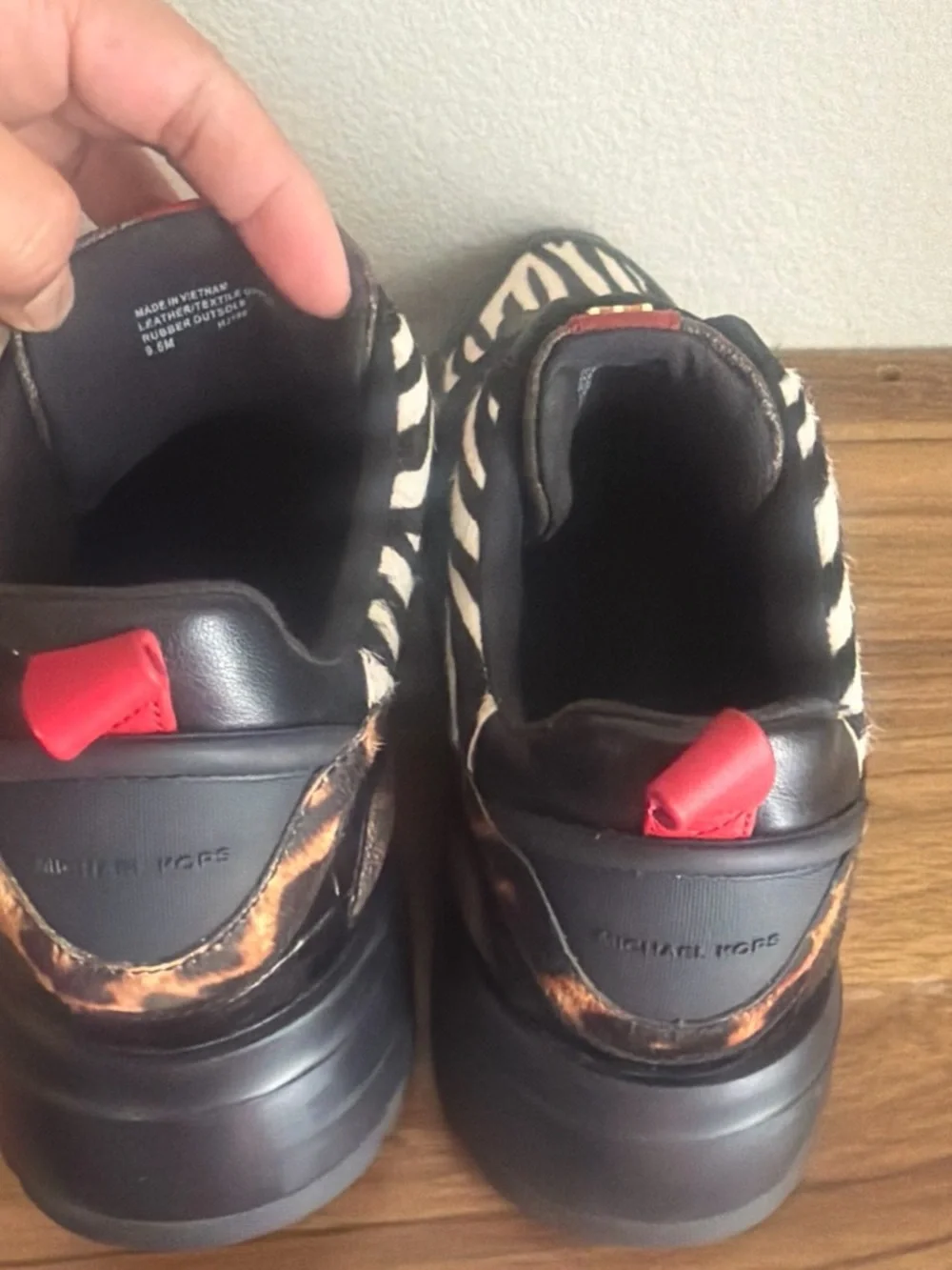 Michael Kors Men’s Black, White & Red Zebra Slip-On Sneakers